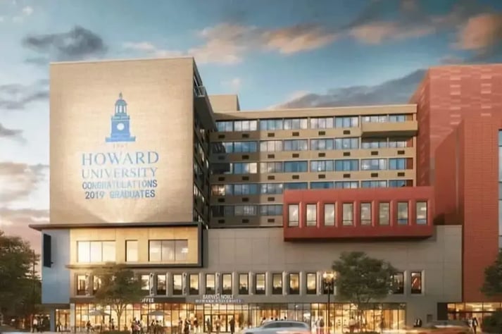 Front view of the complete Howard University College of Medicine building with he name of the school and the school logo prominently on the front of the building