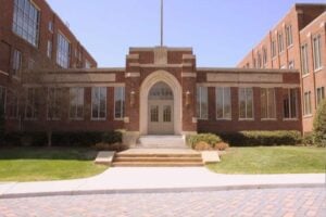 Front street view of the Meharry Medical College with stairs leading to the front door.