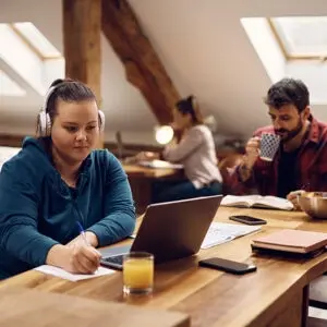 Female student writing a medical school personal statement